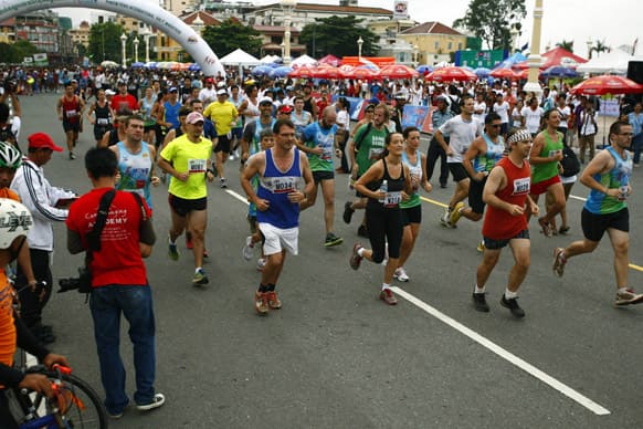 Participants compete in the International Half Marathon, in Phnom Penh, Cambodia. More than 1,000 Cambodians and foreigners took part in the race, which coincided with the birthday of Queen Monineath Sihanouk.