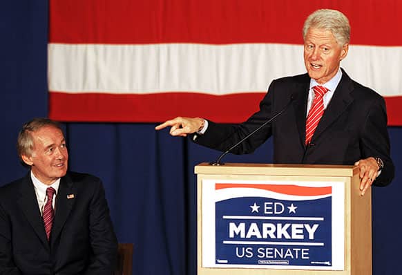 Former President Bill Clinton points to Ed Markey, candidate for US Senate, during a Markey rally at Worcester Polytechnic Institute`s Alden Hall in Worcester, Mass.