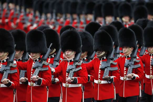 Foot Guards march to the Horse Guards Parade, as part of the Trooping the Colour parade, in London.