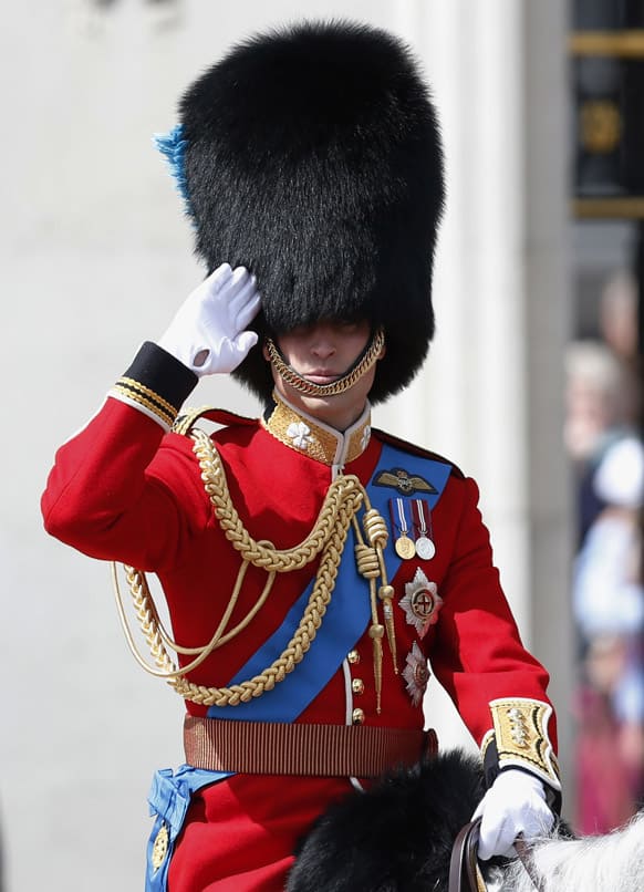 Britain`s Prince William leaves Buckingham Palace on horseback, for the Trooping The Colour parade, at the Horse Guards Parade in London.