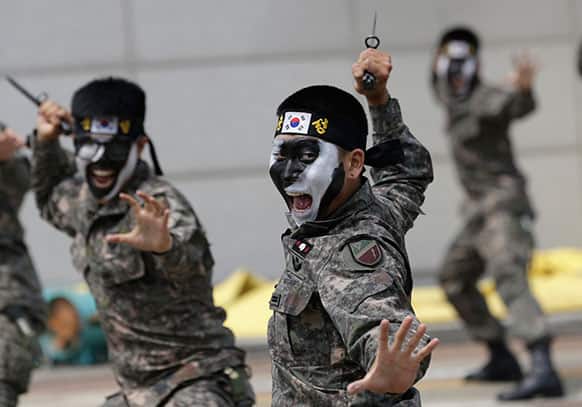South Korean soldiers demonstrate their skills during an anti-terror drills ahead of the 4th Asian Indoor and Martial Arts Games Incheon, which starts from the end of June, in Incheon, west of Seoul, South Korea.