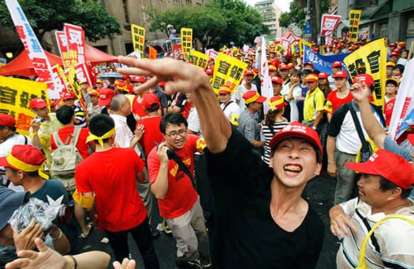 Poultry farmers hurl rotten eggs at police during a protest in front of the Ministry of Agriculture in Taipei, Taiwan.