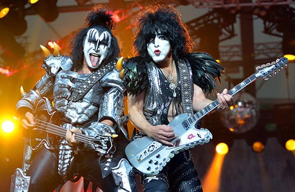 Bassist Gene Simmins, left, and singer Paul Stanley of the US band Kiss perform on stage in Berlin, Germany. It is the only concert of the rock group in Germany during their Monster Tour 2013.