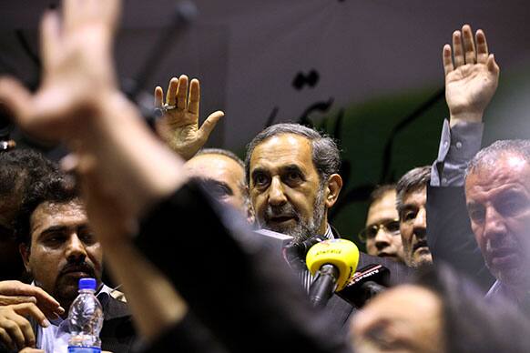Iranian former Foreign Minister and presidential candidate Ali Akbar Velayati, center, delivers his speech in a campaign rally, two days prior to the election, in Tehran.