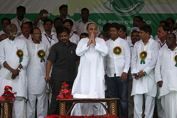 Naveen Patnaik, President of Biju Janata Dal or BJD, and CM of the eastern Indian state of Orissa, greets his supporters at a rally demanding special status for the state of Orissa in New Delhi.