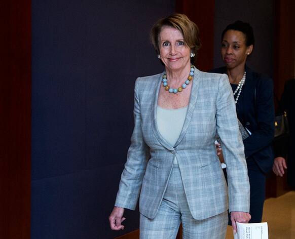 House Democratic Leader Nancy Pelosi, D-Calif., arrives for a closed all-member briefing on the NSA on Capitol Hill in Washington.