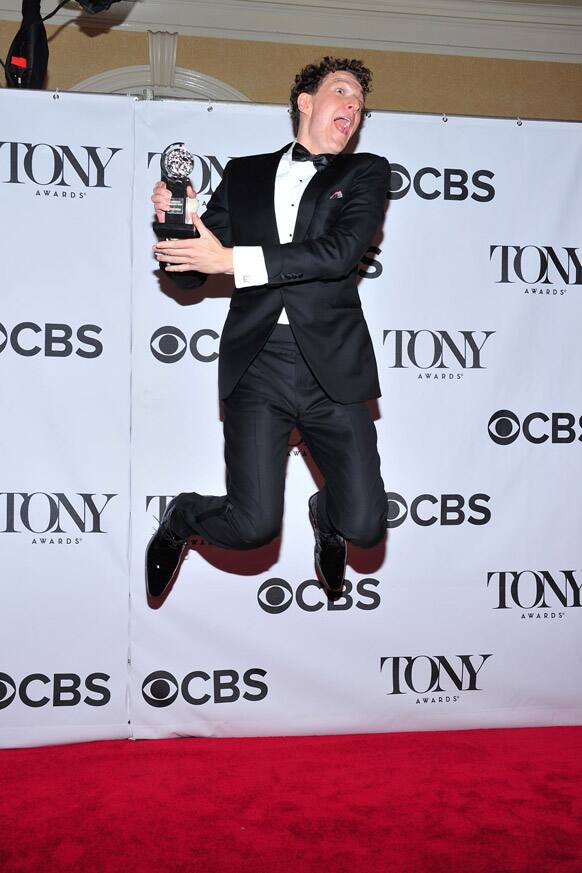 Gabriel Ebert poses with his award for best performance by an actor in a featured role in a musical, for
