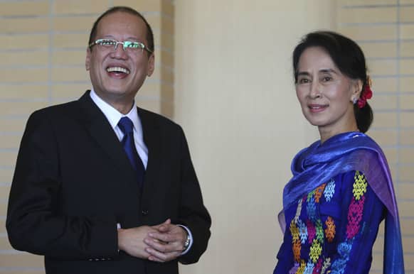 Philippine President Benigno Aquino III, is welcomed by Myanmar opposition leader Aung San Suu Kyi on the sideline of the World Economic Forum which the Philippines will be hosting next year in Naypyitaw, Myanmar.