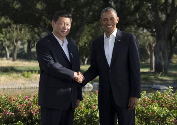 President Barack Obama shakes hands with Chinese President Xi Jinping at the Annenberg Retreat at Sunnylands for bilateral meetings, in Rancho Mirage, Calif.