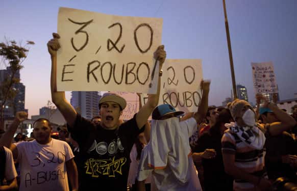 Demonstrators protest the increase of public transportation for buses and the subway from 3 Reales to 3.20 Reales, which is about 1.50 U.S. dollars, in Sao Paulo, Brazil.
