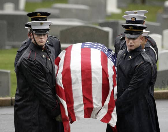 The flag draped casket of the late New Jersey Sen. Frank Lautenberg is carried by members of the Joint Military Casket Team during burial services at Arlington National in Arlington, Va.