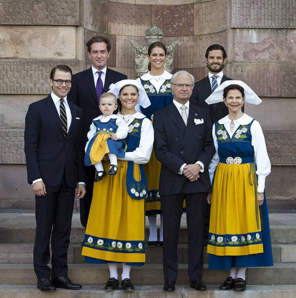 The Swedish Royal family, Prince Daniel, Chris O`Neill, Princess Estelle, Crown Princess Victoria, Princess Madeleine, King Carl Gustaf, Prince Carl Philip and Queen Silvia pose for a family photo during the Swedish National Day celebrations at the Royal Palace in Stockholm, Sweden.