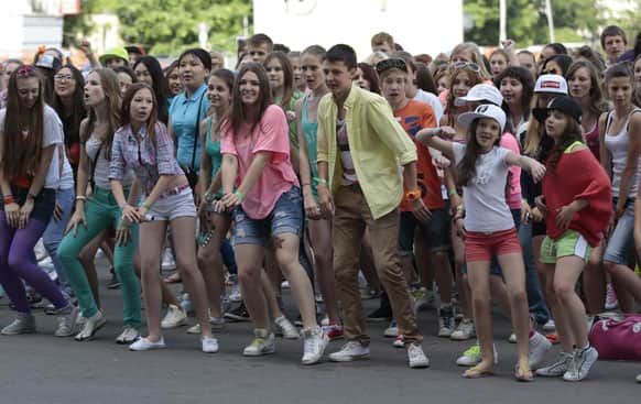 Russian fans of South Korean musician PSY perform a