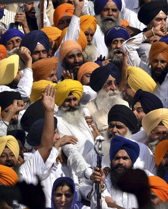 Sikhs take part in a prayer meeting in remembrance of Sikhs who lost their lives during the 1984 Operation Blue Star at the Golden Temple in Amritsar.