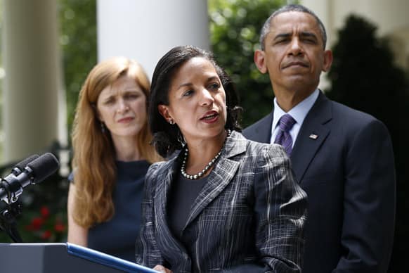 President Barack Obama listens as UN Ambassador Susan Rice, his choice to be his next National Security Adviser, speaks in the Rose Garden at the White House in Washington.