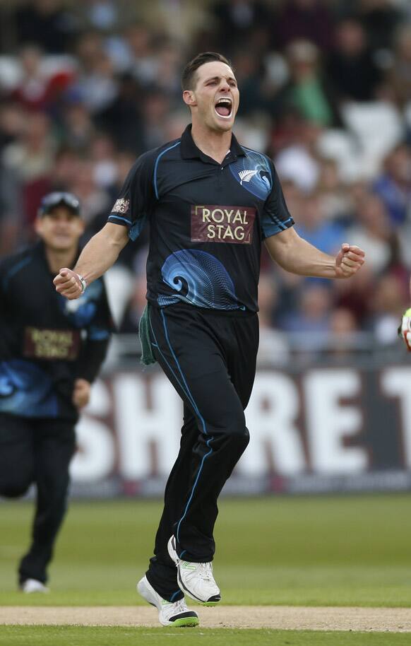 New Zealand`s Mitchell McClenaghan celebrates taking the wicket of England`s captain Alastair Cook, not pictured, LBW during the third one-day international cricket match between England and New Zealand at Trent Bridge cricket ground in Nottingham, England.