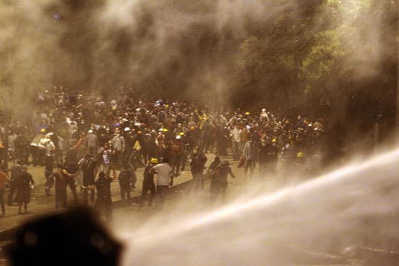 Police operate with tear gas and water cannon against protesters during clashes for fifth day in Istanbul.