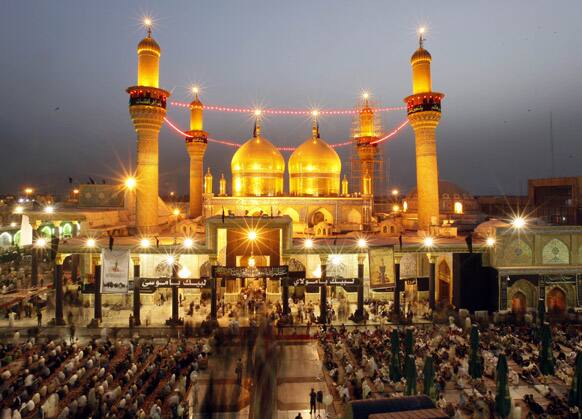 Shiite pilgrims gather at the Imam Moussa al-Kadhim shrine during the preparations for the annual commemoration of the saint`s death in the Shiite district of Kazimiyah, in Baghdad, Iraq.