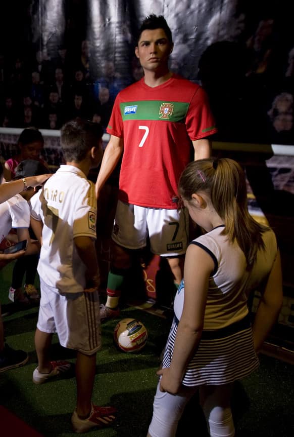 Cristiano Ronaldo`s wax figure seen in the Sea Life aquarium in Porto, Portugal. The striker`s figure wearing his national team will be exhibited with sharks, rays and horseshoe crabs till June 15, before moving to Madame Tussauds New York.