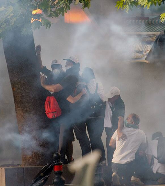 Young Turks clash with security forces in Ankara. Turkey`s PM Recep Tayyip Erdogan rejected claims that he is a