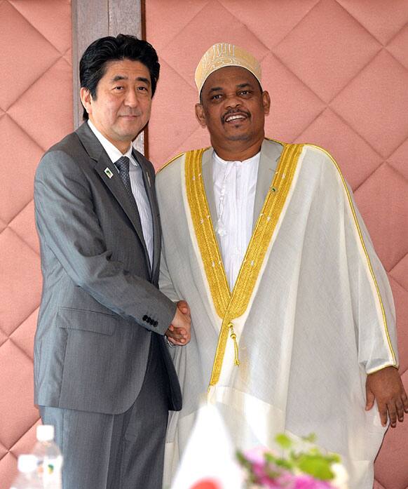 Union of Comoros President Ikililou Dhoinine, right, is greeted by Japanese Prime Minister Shinzo Abe prior to their bilateral talks during the Tokyo International Conference on African Development (TICAD) in Yokohama, suburban Tokyo.