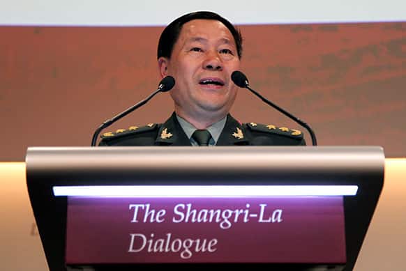 China`s Lt. Gen. Qi Jianguo, Deputy Chief of General Staff, People’s Liberation Army, delivers his speech at the International Institute for Strategic Studies Shangri-la Dialogue, or IISS Asia Security Summit in Singapore.