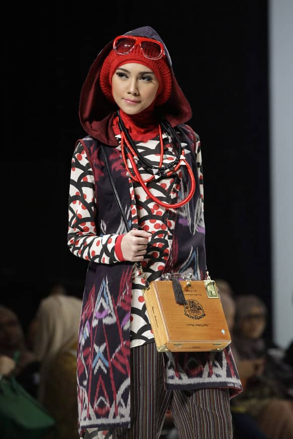 A model displays a creation of Indonesian designer Hannie Hananto during Indonesia Islamic Fashion Fair in Jakarta.