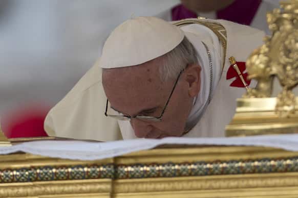 Pope Francis celebrates the Corpus Domini mass in front of St. John at the Lateran Basilica, to mark the feast of the Body and Blood of Christ, in Rome.