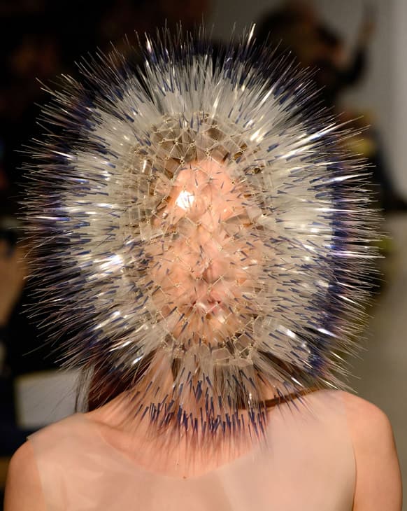 A model wears a design by Maiko Takeda during the Royal College of Art graduate fashion show at the Royal College of Art, in London.