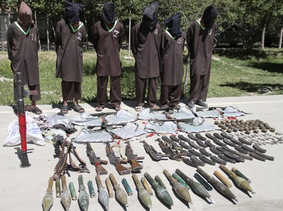 Insurgents suspected of being from the Haqqani network are presented to the media at the intelligence agents of Security (NDS) headquarters in Kabul, Afghanistan.