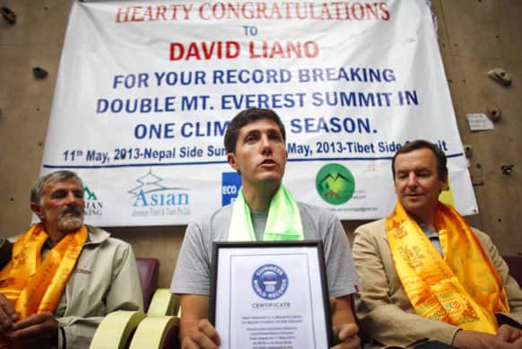 Mexican climber David Liano Gonzalez, talks to the media after he was felicitated with a Guinness World Record certificate that recognized him as the first person to scale Mount Everest from both the north and south sides in the same climbing season at a ceremony in Katmandu.