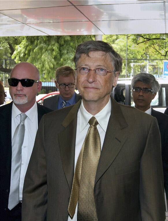 Microsoft founder and philanthropist Bill Gates, center, arrives for a meeting with India`s Planning Commission Deputy Chairman Montek Singh Ahluwalia, in New Delhi.