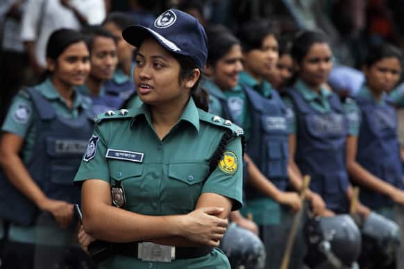 Bangladeshi riot policewomen stand guard outside the office of the main opposition Bangladesh Nationalist Party (BNP) during a nationwide dawn-to-dusk shutdown called by an alliance of 18 opposition parties in Dhaka.