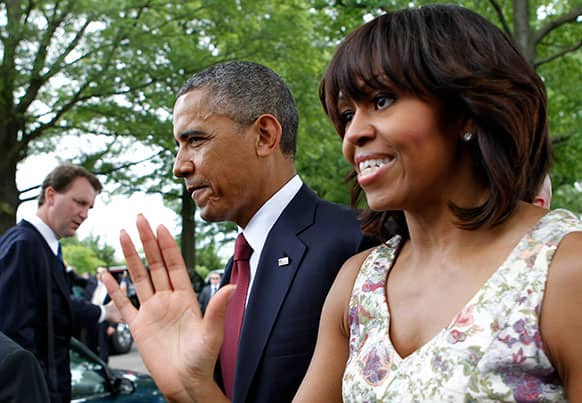 President Barack Obama and first lady Michelle leave after visiting Section 60 of Arlington National Cemetery on Memorial Day in Arlington, Va.