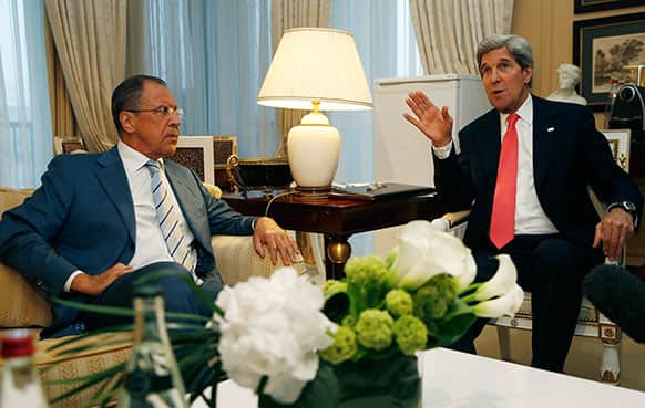 US Secretary of State John Kerry, right, meets with Russian Foreign Minister Sergei Lavrov in Paris.