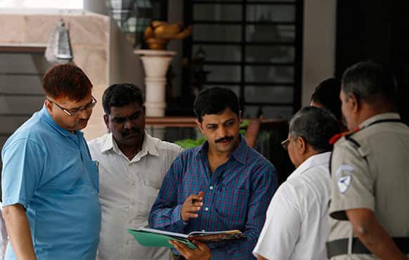 India’s Mumbai Crime Branch police officers raid the residence of Gurunath Meiyappan, the chief executive of the Chennai Super Kings cricket team in Chennai, India.