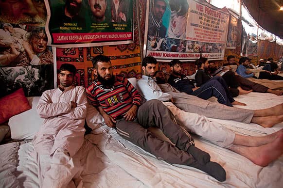 Kashmiri Muslim supporters and activists of Jammu and Kashmir Liberation Front (JKLF) participate in a hunger strike in Srinagar, India.