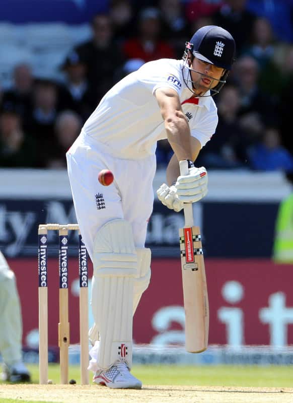 England`s captain Alastair Cook, plays a shot bowled by New Zealand`s Doug Bracewell on the second day of the second test match between England and New Zealand at Headingley cricket ground in Leeds, England.