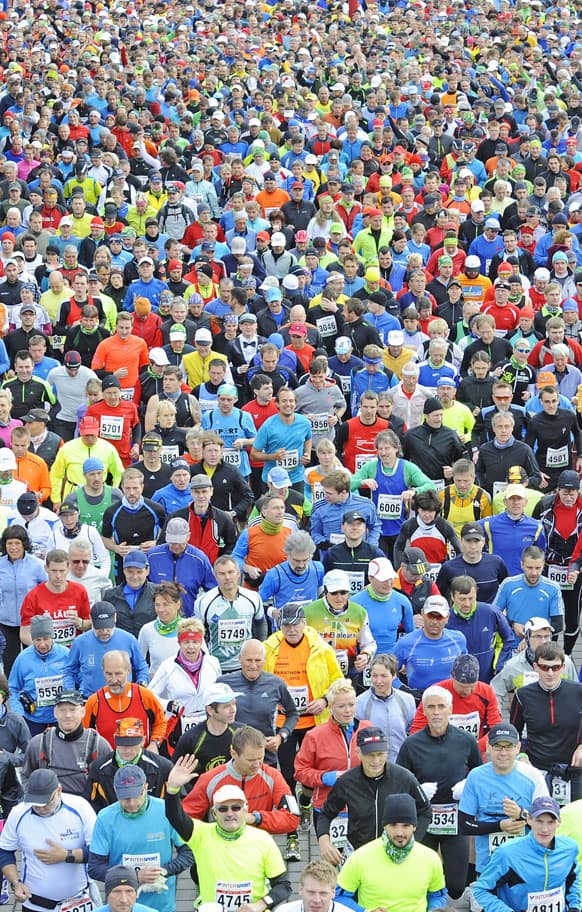 Runners start at the `GutsMuths Rennsteiglauf` marathon, one of Europe`s most popular cross-country races, in Neuhaus am Rennweg, Germany.