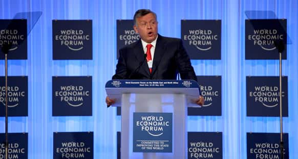 King Abdullah II of Jordan gives the opening speech at the World Economic Forum, held at the King Hussein Bin Talal Convention center, in Southern Shuneh, 34 miles (55 kilometers) southeast of Amman, Jordan.
