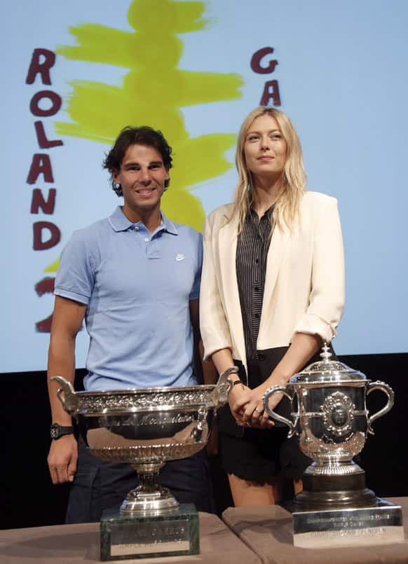 Spain`s Rafael Nadal and Russia`s Maria Sharapova pose during the draw for the 2013 French Open tennis tournament, at Roland Garros stadium in Paris.