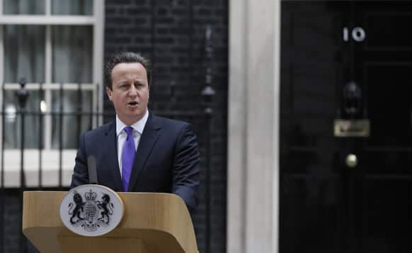 Britain`s Prime Minister David Cameron speaking to the media outside 10 Downing Street in London.