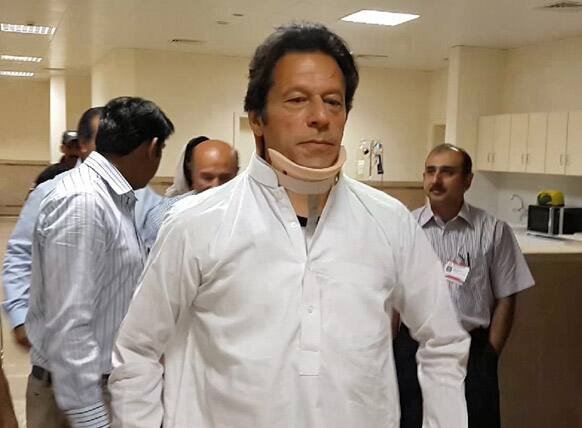Imran Khan, leader of Pakistan Tehreek-e-Insaf party leaves the hospital in Lahore. Khan left the hospital Wednesday, more than two weeks after he suffered serious back injuries in a fall from a forklift at a campaign event.