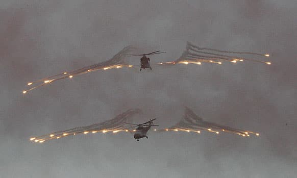 South Korean Army`s first produced military helicopters, the Surion, fire flare shells during the rehearsal of the ceremony to celebrate its deployment, at the Army Aviation School in Nonsan, South Korea.