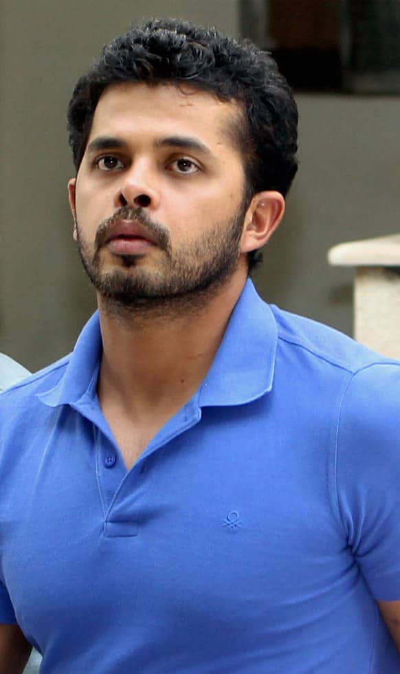 Shantakumaran Sreesanth walks towards a court in New Delhi. India`s top court has asked the Board of Control for Cricket (BCCI) to wrap up in two weeks its investigation into alleged spot-fixing in the ongoing domestic Twenty20 league.