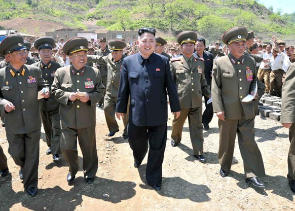 This undated photo released by the Korean Central News Agency, North Korean leader Kim Jong Un, visits the Breeding Station No. 621 of the Korean People`s Army under construction at an undisclosed location of North Korea.