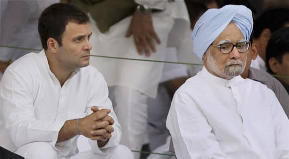 Rahul Gandhi, sits with Prime Minister Manmohan Singh, at a prayer meeting to mark the death anniversary of his father and former Prime Minister Rajiv Gandhi at his memorial in New Delhi. Rajiv Gandhi was killed in a suicide bomb attack on May 21, 1991 in Tamil Nadu during a poll campaign.