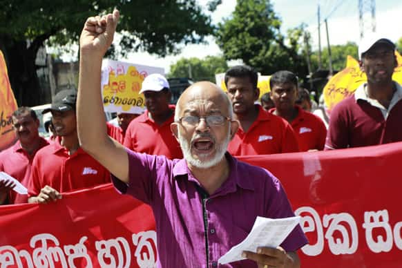 A Sri Lankan trade union activist shouts slogans during a protest in Ratmalana, on the outskirts of Colombo, Sri Lanka.