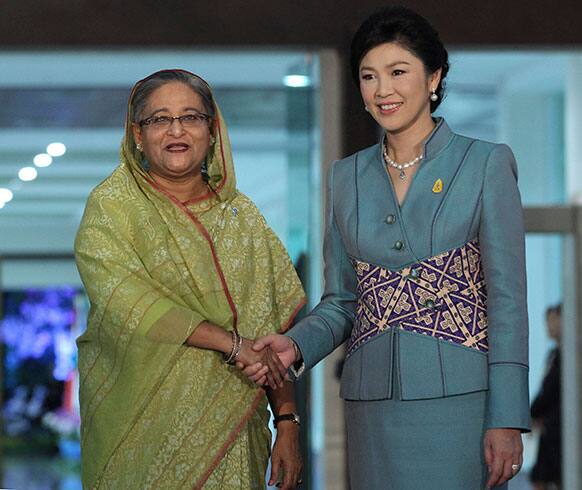 Bangladesh PM Sheikh Hasina shakes hand with Thailand PM Yingluck Shinawatra before a meeting in Chiang Mai, north of Bangkok, Thailand.