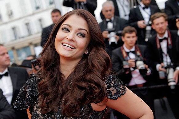 Actress Aishwarya Rai poses for photographers as she arrives for the screening of the film Inside Llewyn Davis at the 66th international film festival.